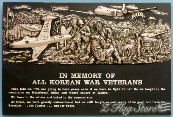 A plaque with an image of a korean war veterans memorial.